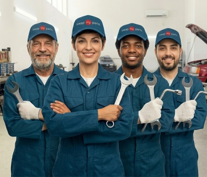 SwapMyParts mechanics team in branded workwear at the testing facility